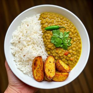 Traditional Kinema served with rice on a banana leaf