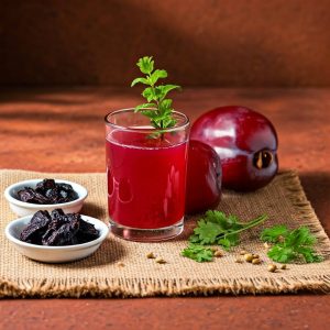 Kokum Sharbat served in a glass with ice and mint leaves, a refreshing summer drink