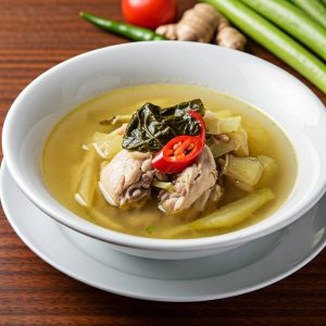 Tinolang Manok Filipino chicken soup with ginger, green papaya, and chili leaves