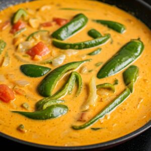 Ema Datshi Bhutanese chili and cheese stew served in a rustic bowl